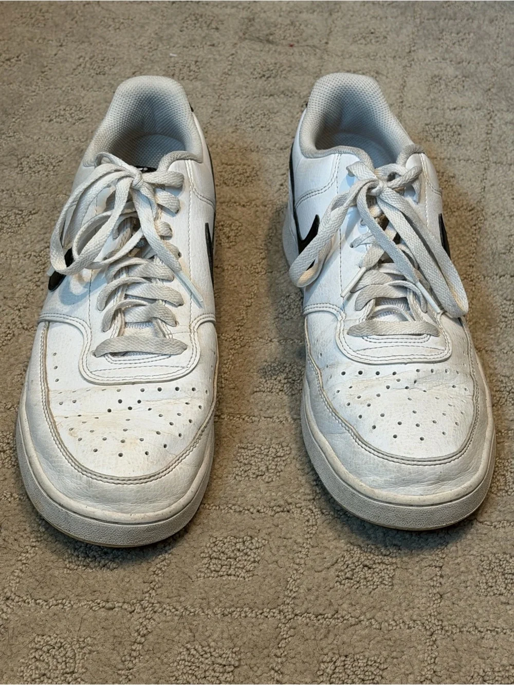 Nike White Low-Top Sneakers with Black Swoosh